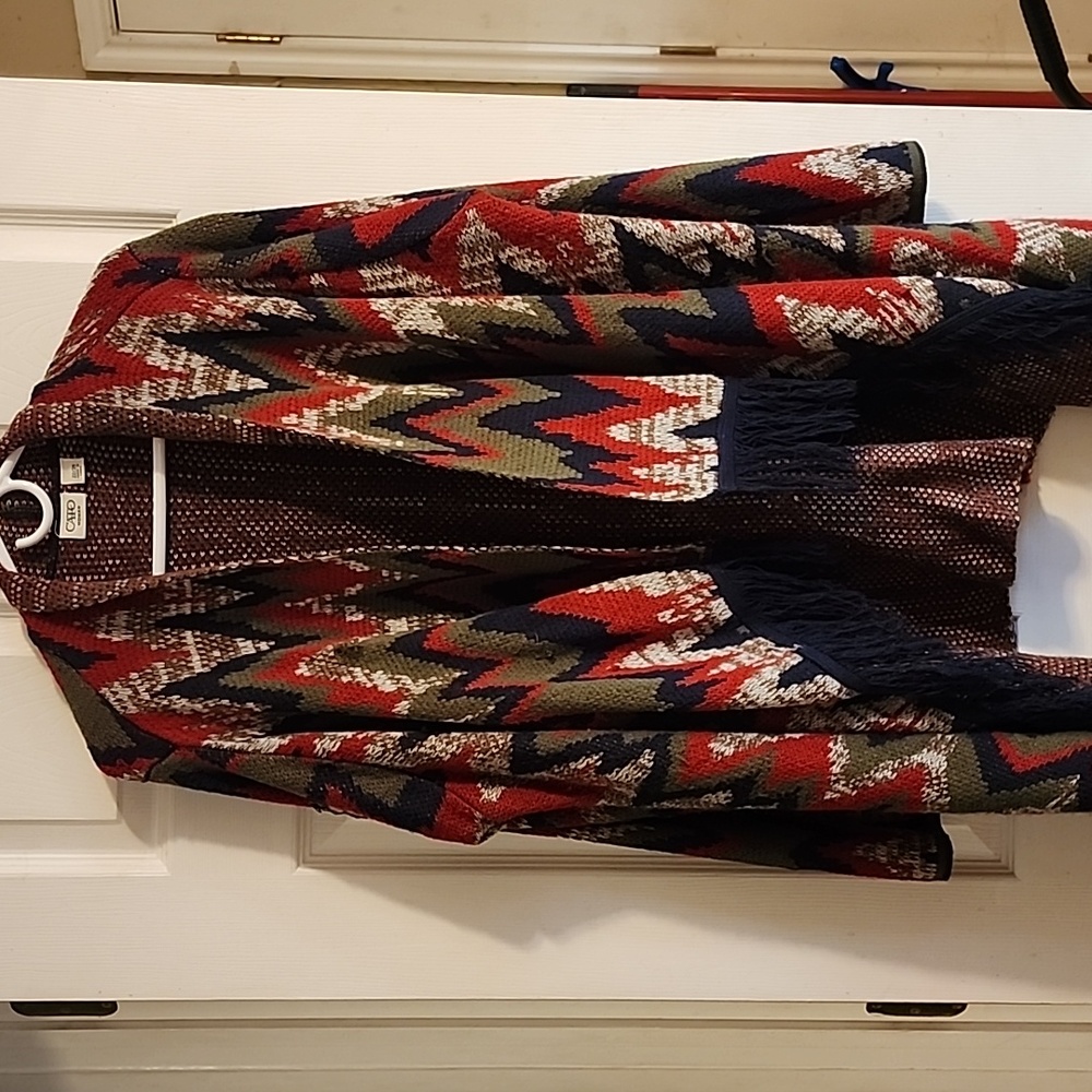 Cato tappered Sweater with fringe.